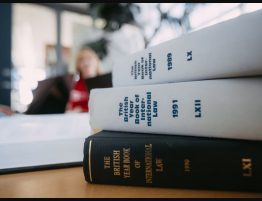 Volumes of The British Year Book of International Law on a desk