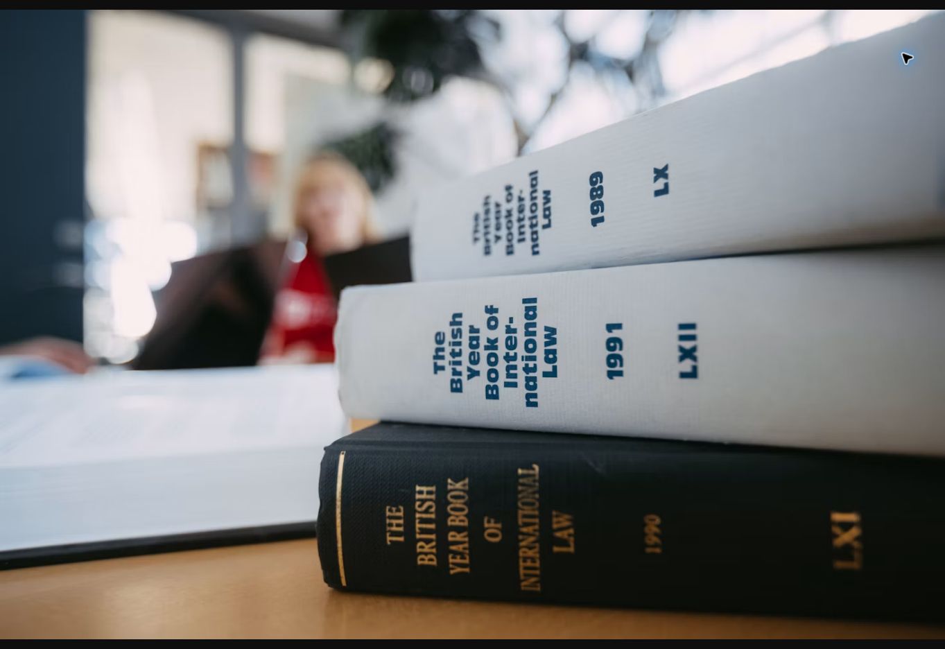 Volumes of The British Year Book of International Law on a desk